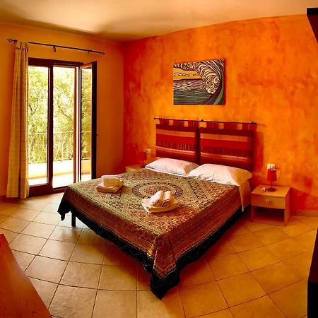 Residenze L'Isola Surf House Aparthotel Porto Pollo Buitenkant foto