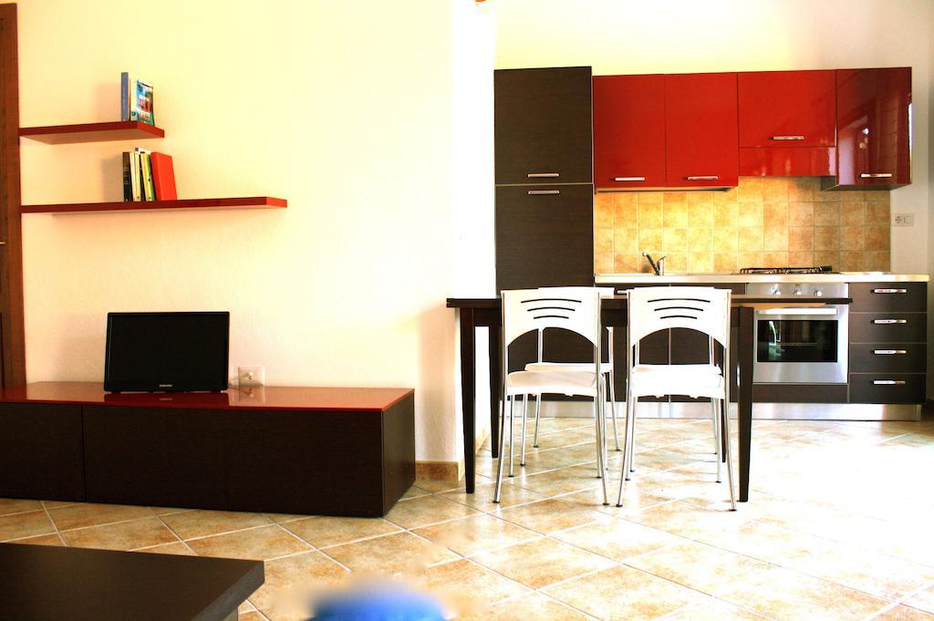 Residenze L'Isola Surf House Aparthotel Porto Pollo Kamer foto