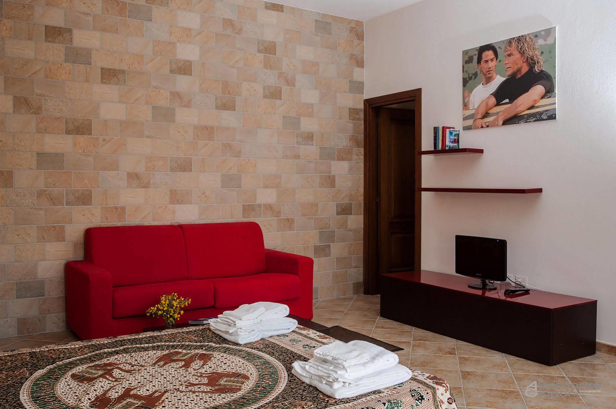 Residenze L'Isola Surf House Aparthotel Porto Pollo Buitenkant foto