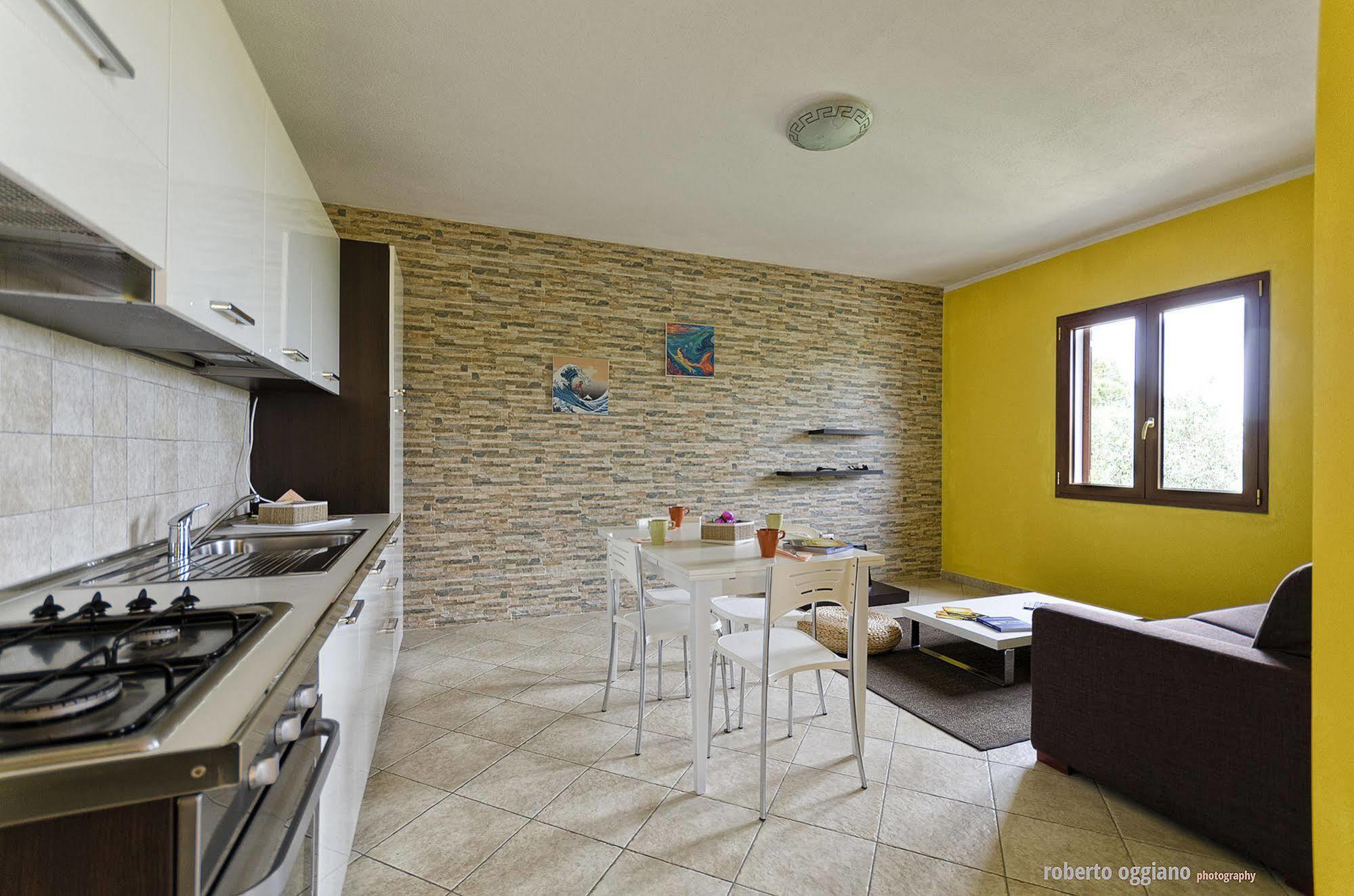 Residenze L'Isola Surf House Aparthotel Porto Pollo Buitenkant foto