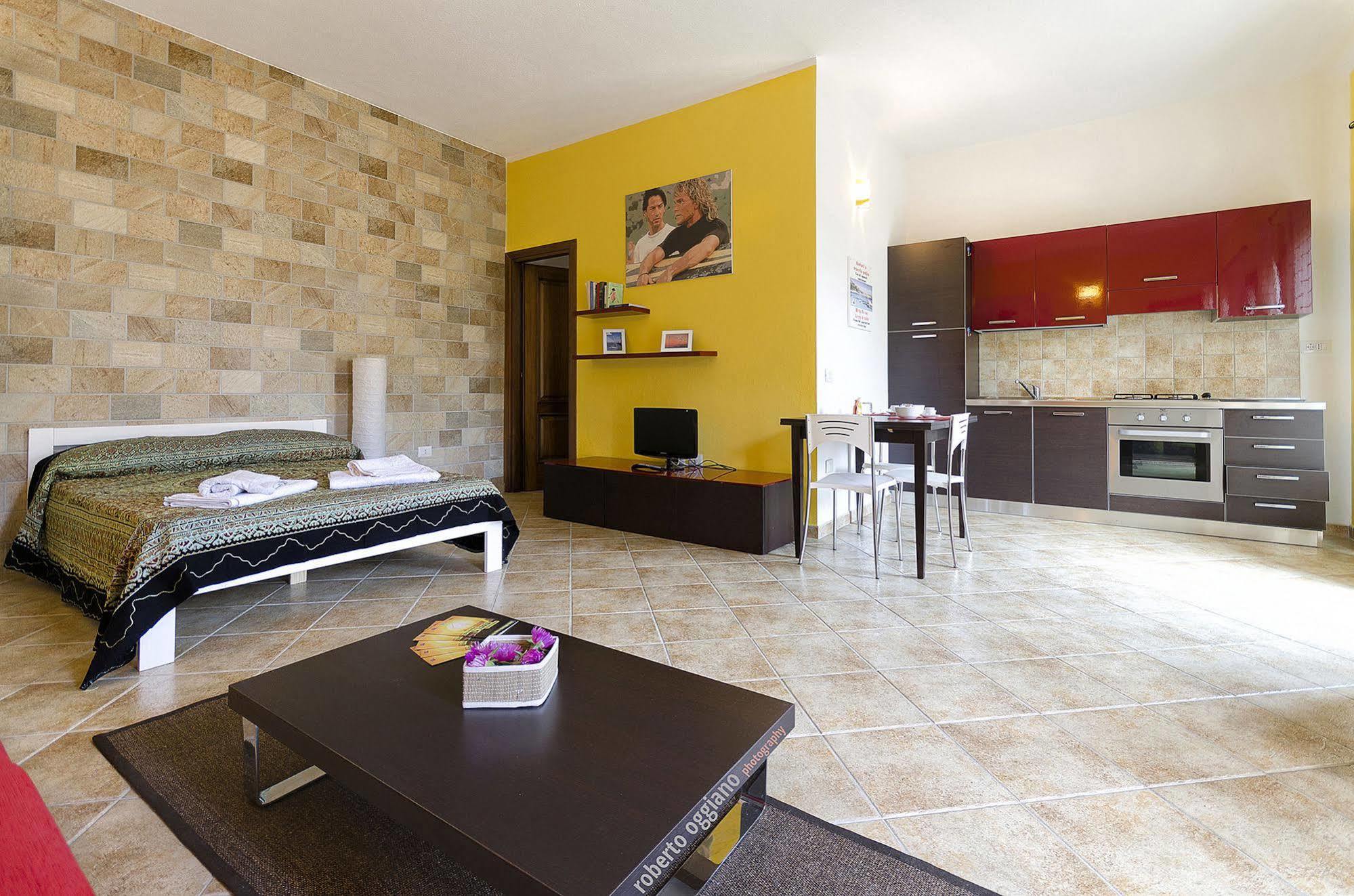 Residenze L'Isola Surf House Aparthotel Porto Pollo Buitenkant foto