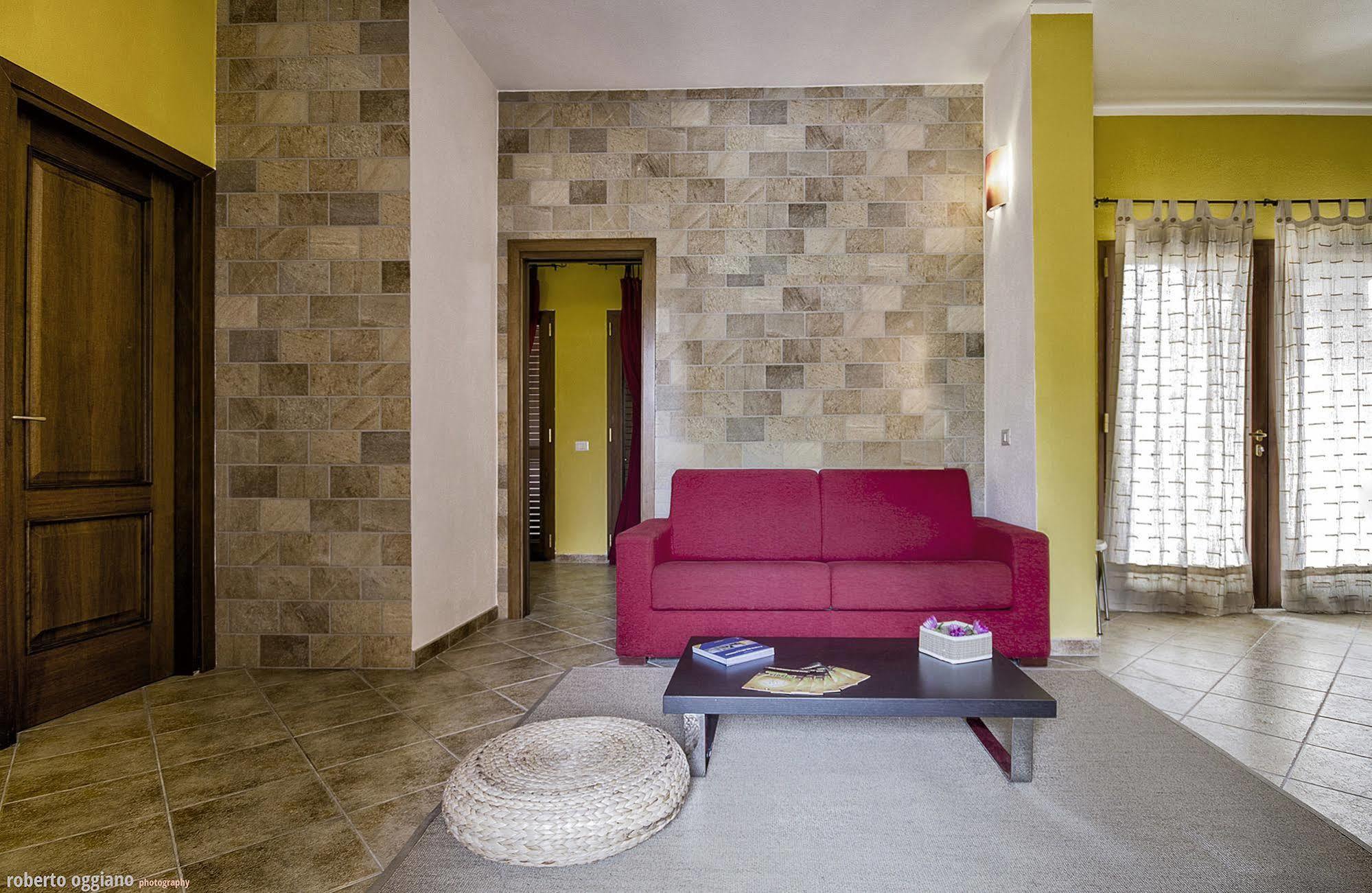 Residenze L'Isola Surf House Aparthotel Porto Pollo Buitenkant foto