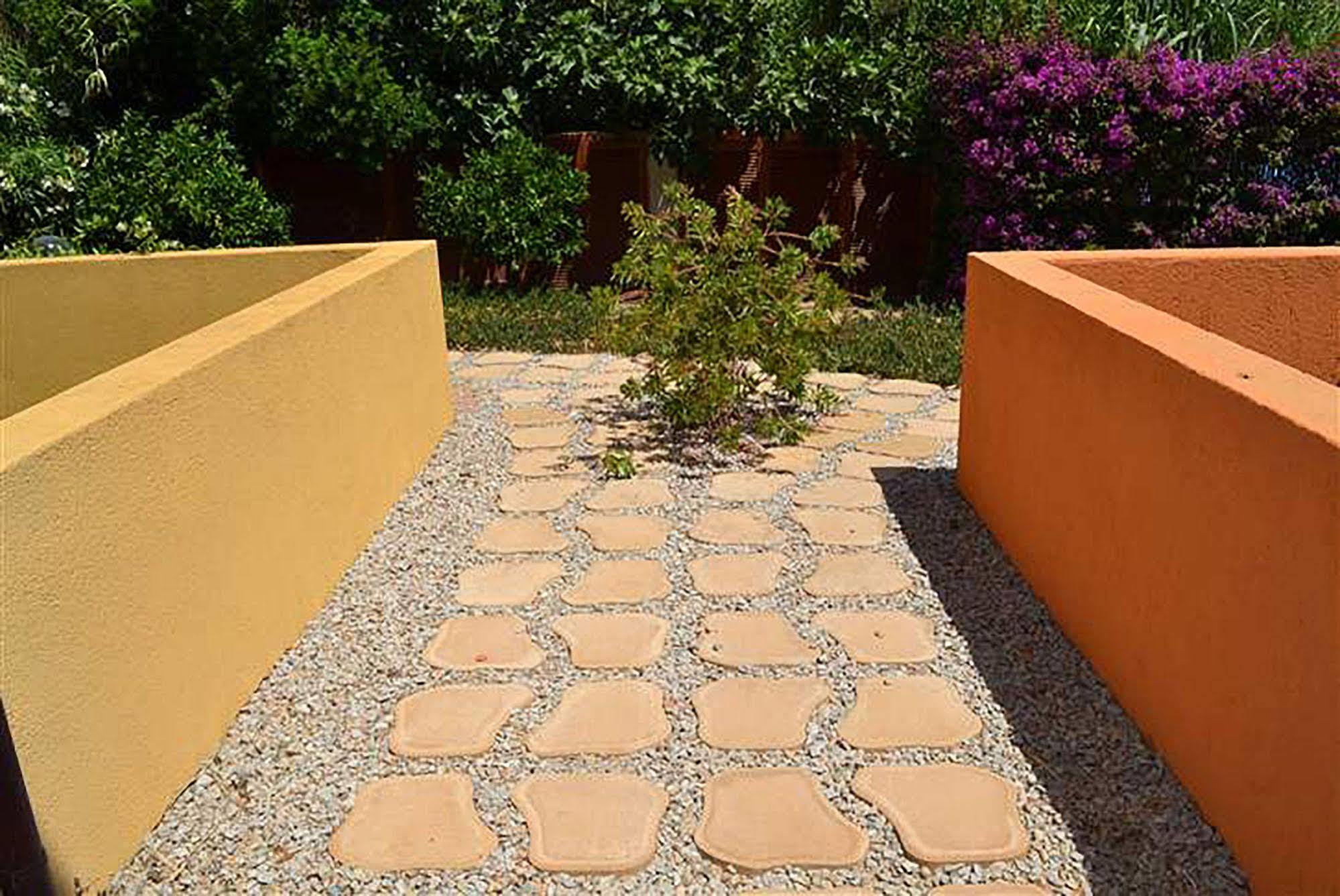 Residenze L'Isola Surf House Aparthotel Porto Pollo Buitenkant foto